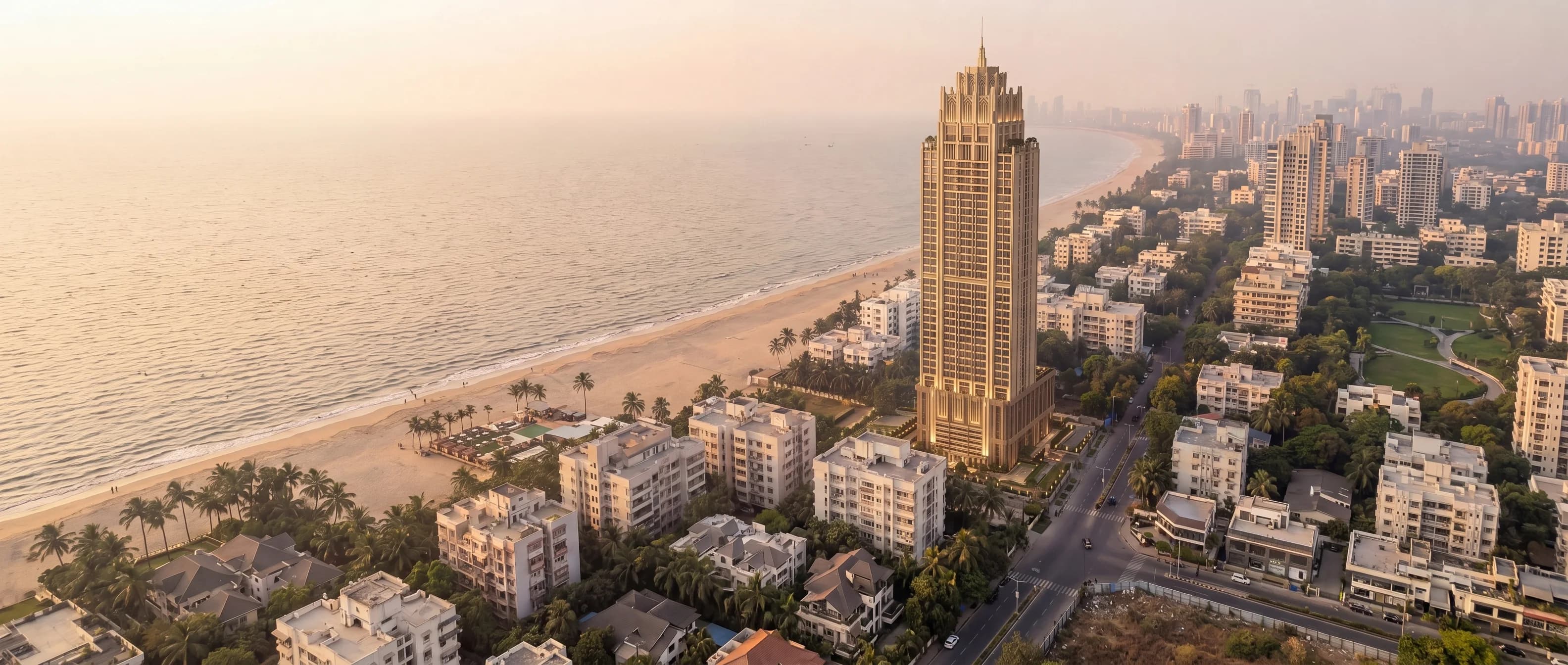 Mumbai's western coastline at dusk, a Lotus tower standing over the beachfront.